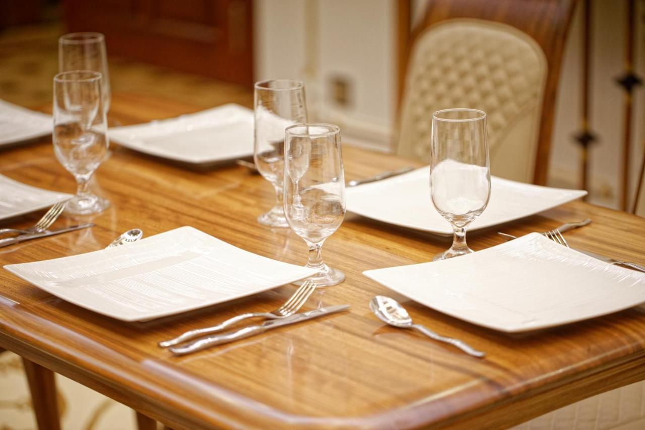 Royal Swiss Lahore Exterior foto A table set for a meal